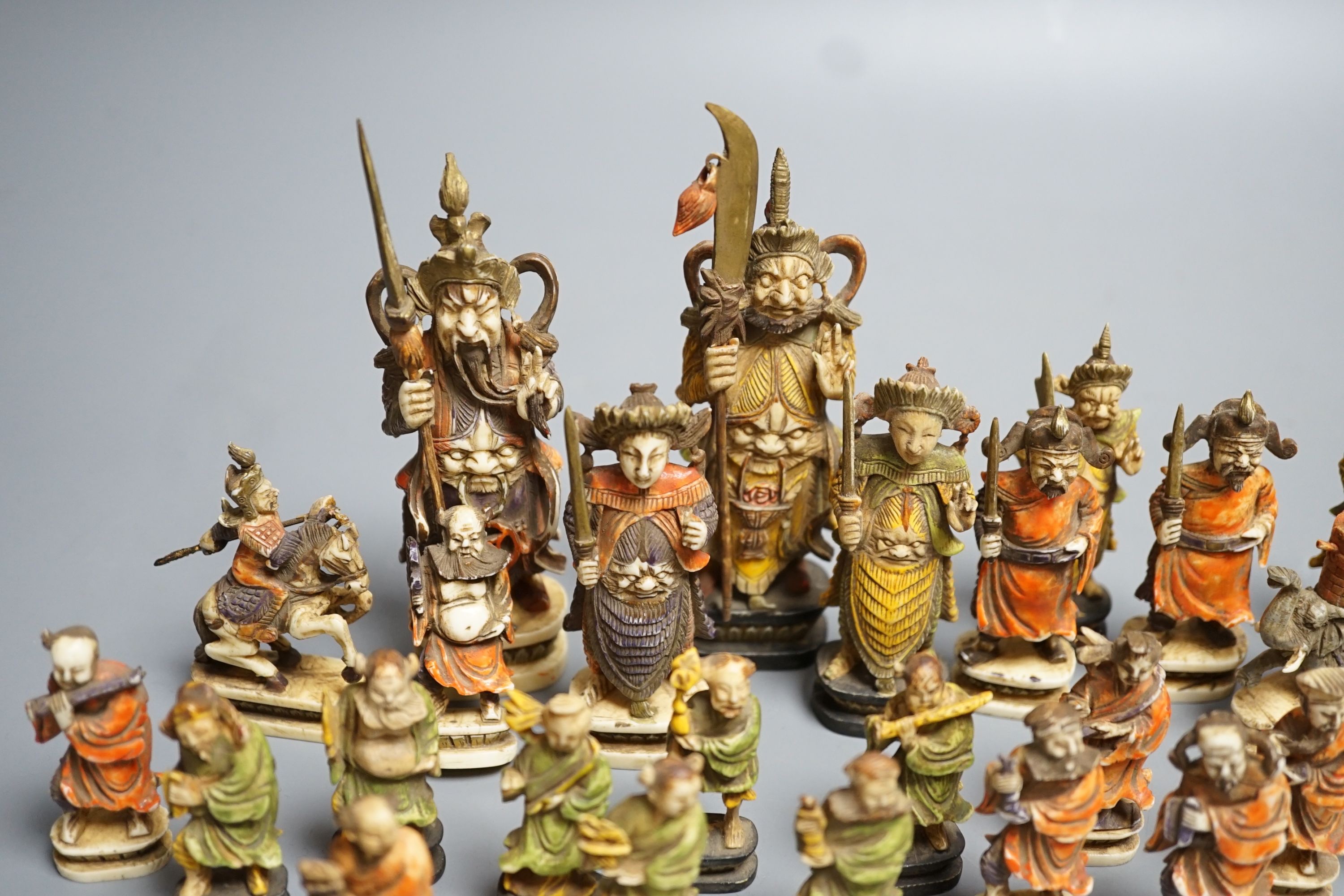 An early 20th century south East Asian stained ivory chess set